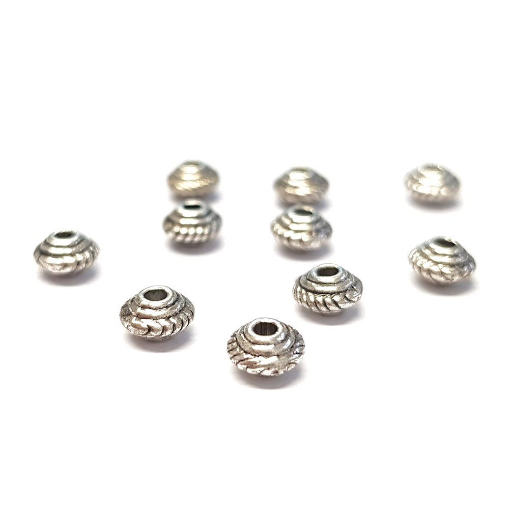 Perles metal toupie 5 x 3 mm argenté