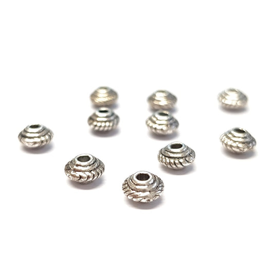 Perles metal toupie 5 x 3 mm argenté