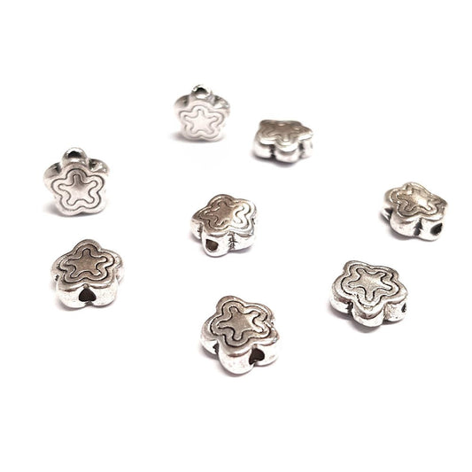 Perles métal étoile style tibétain 7 mm