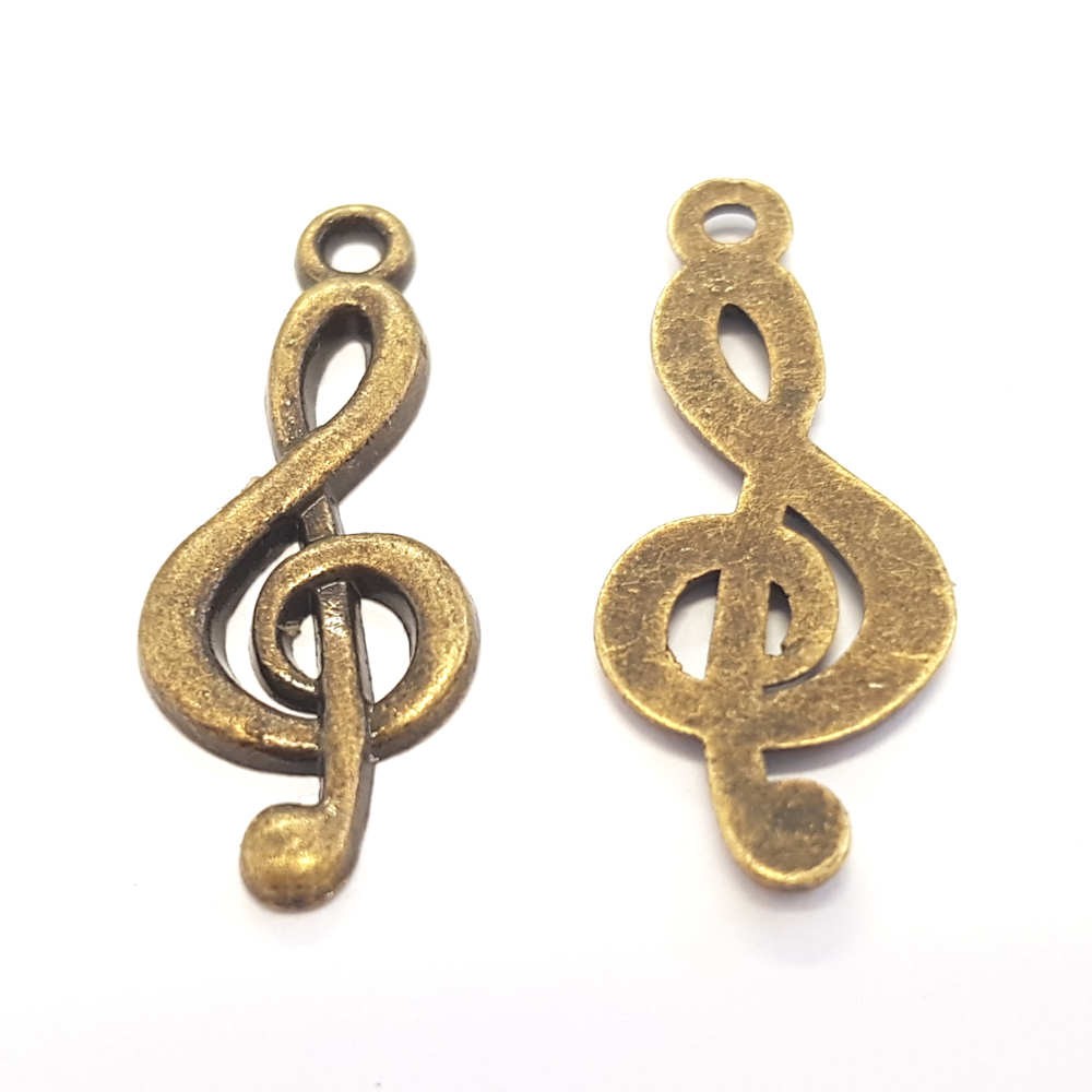 Breloque pendentif clé de sol style tibétain bronze