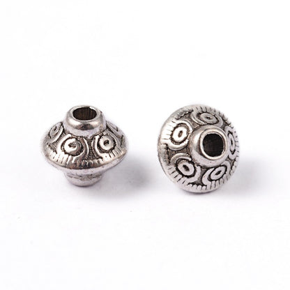 Perles toupie tibétaines en métal 6.5 x 7 mm