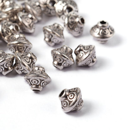 Perles toupie tibétaines en métal 6.5 x 7 mm