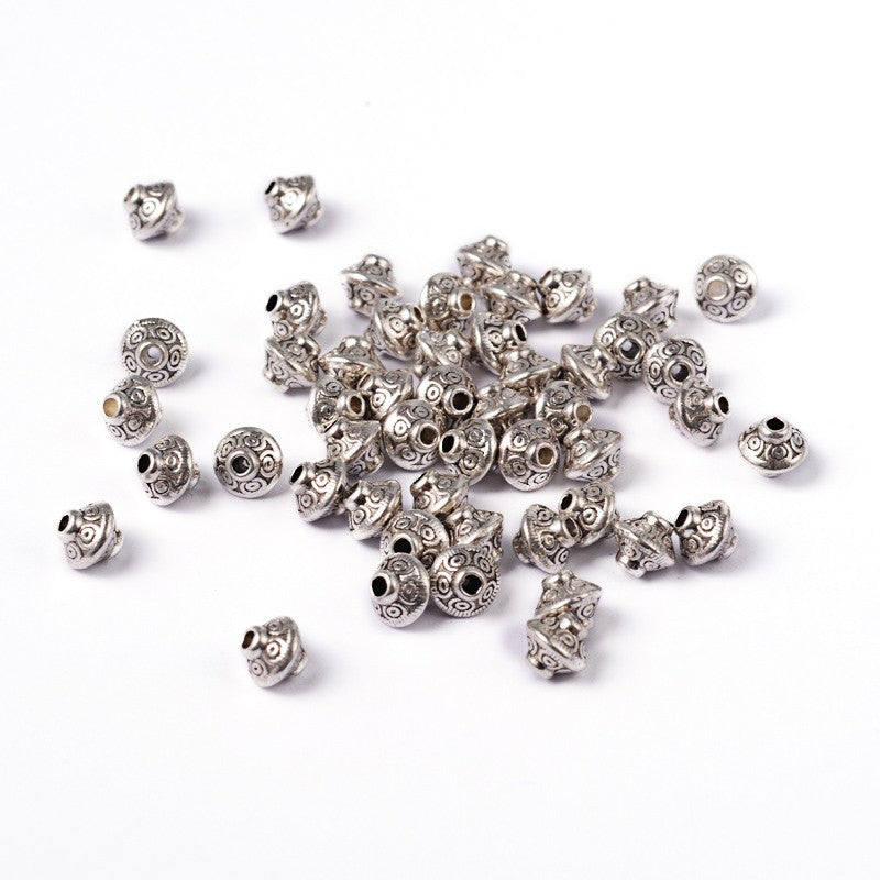 Perles toupie tibétaines en métal 6.5 x 7 mm