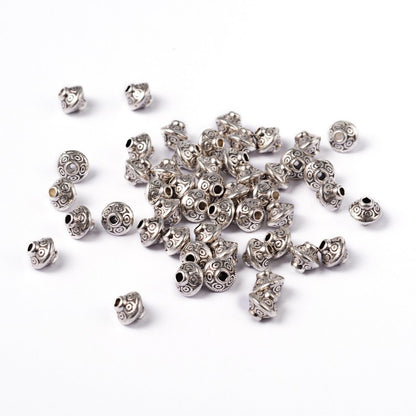 Perles toupie tibétaines en métal 6.5 x 7 mm