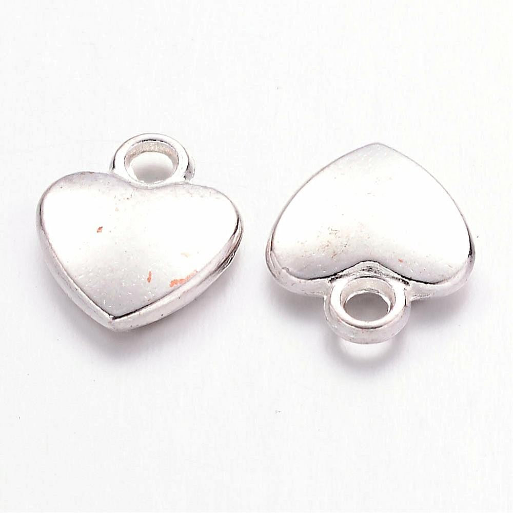Breloque pendentif coeur argenté style tibétain